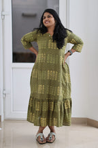 Olive green Hakoba cotton 30+ office kurta dress, front view with smile
