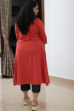 Back view of red striped office kurta showing coverage and relaxed fit