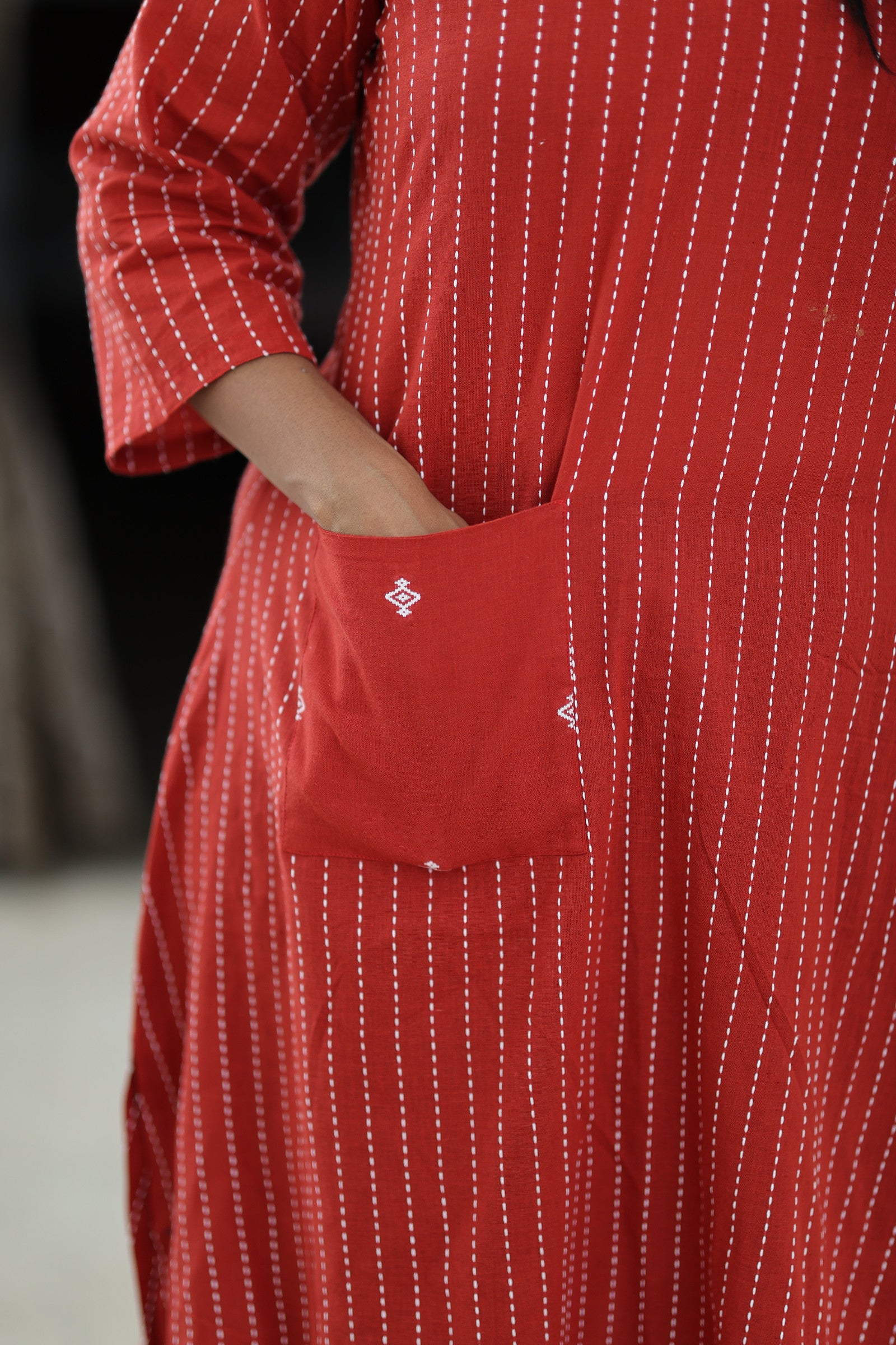 Statement patch pocket detail on red zero-finished cotton kurta