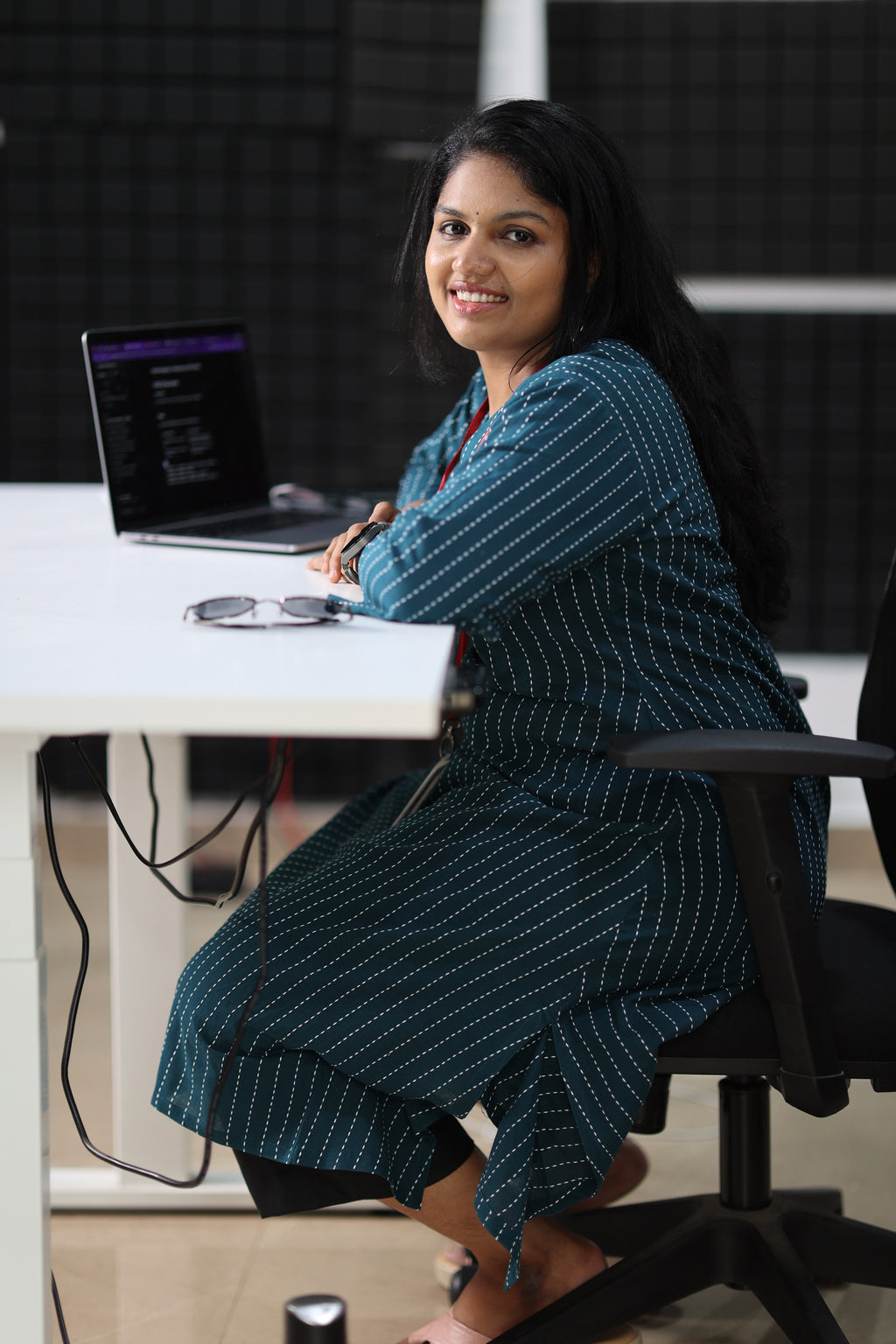 Seated office comfort in teal striped 30+ kurta
