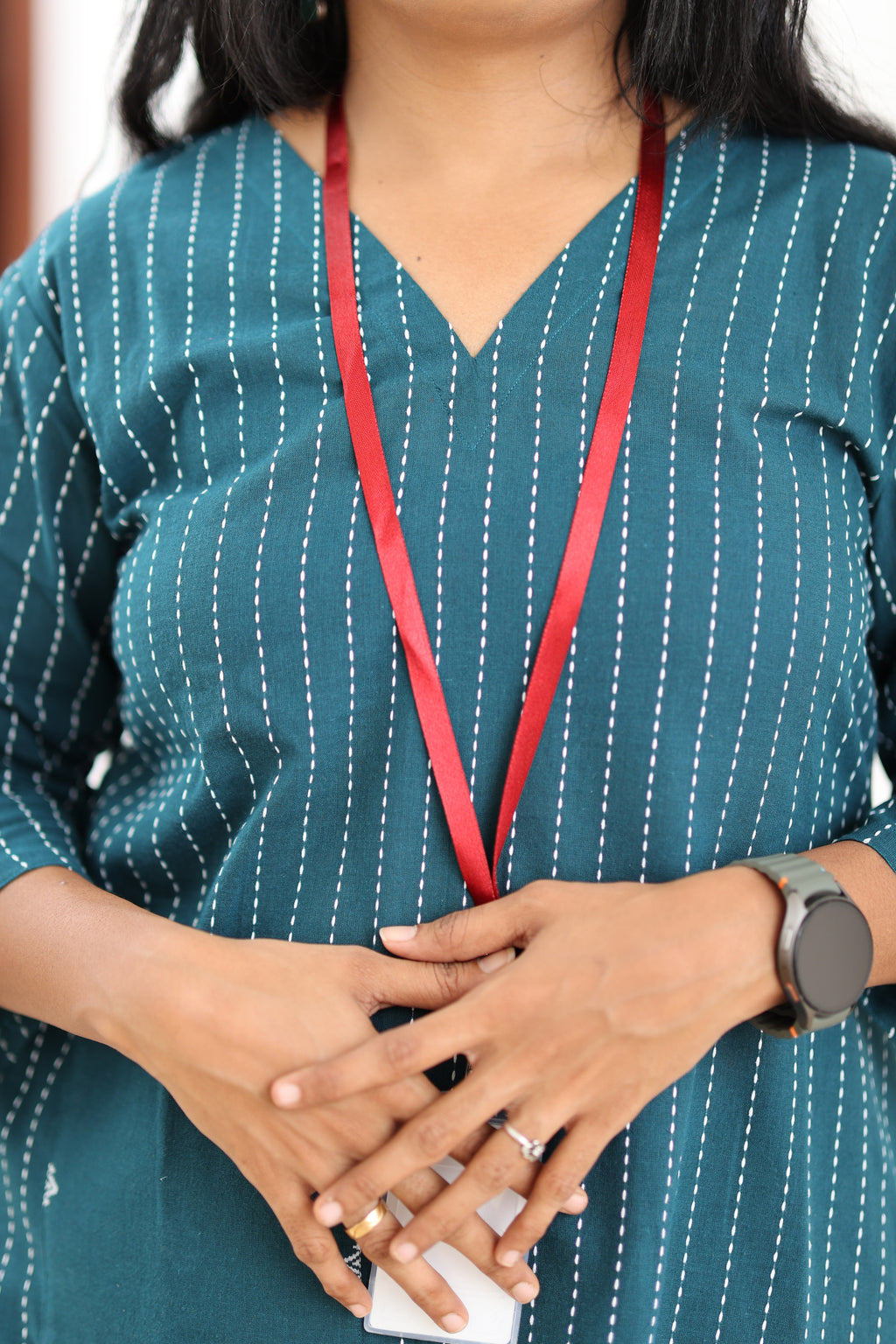 V-neck and white stripe detail on teal 30+ office kurta