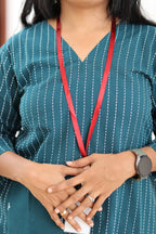 V-neck and white stripe detail on teal 30+ office kurta