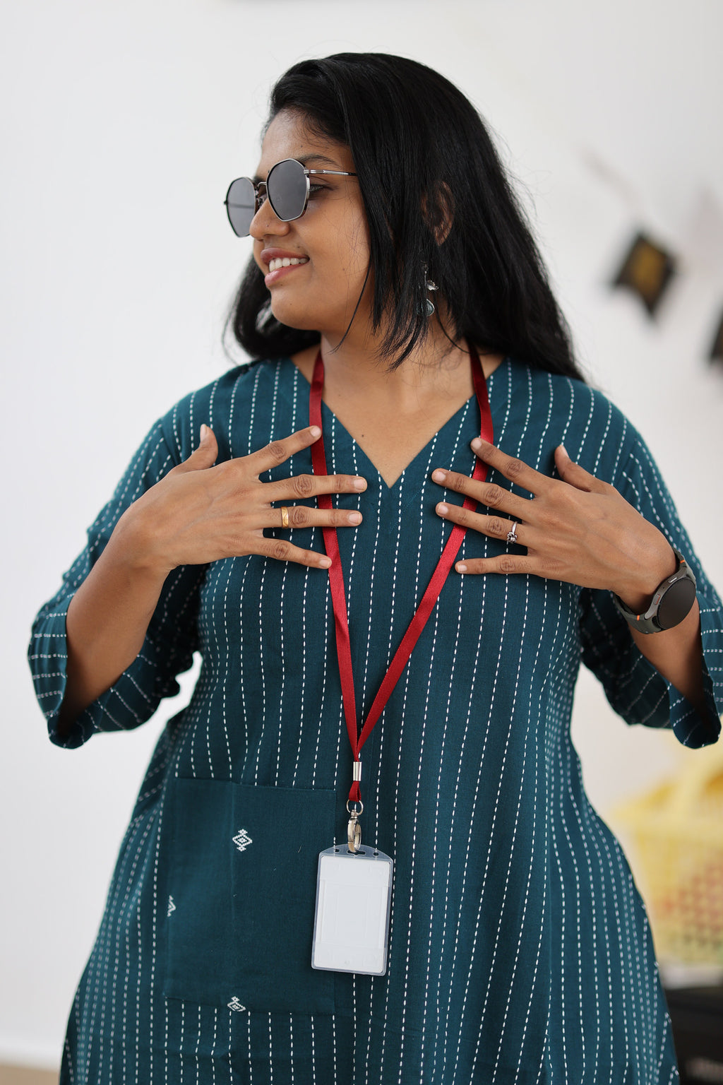 Teal striped 30+ office kurta neckline and pocket styling