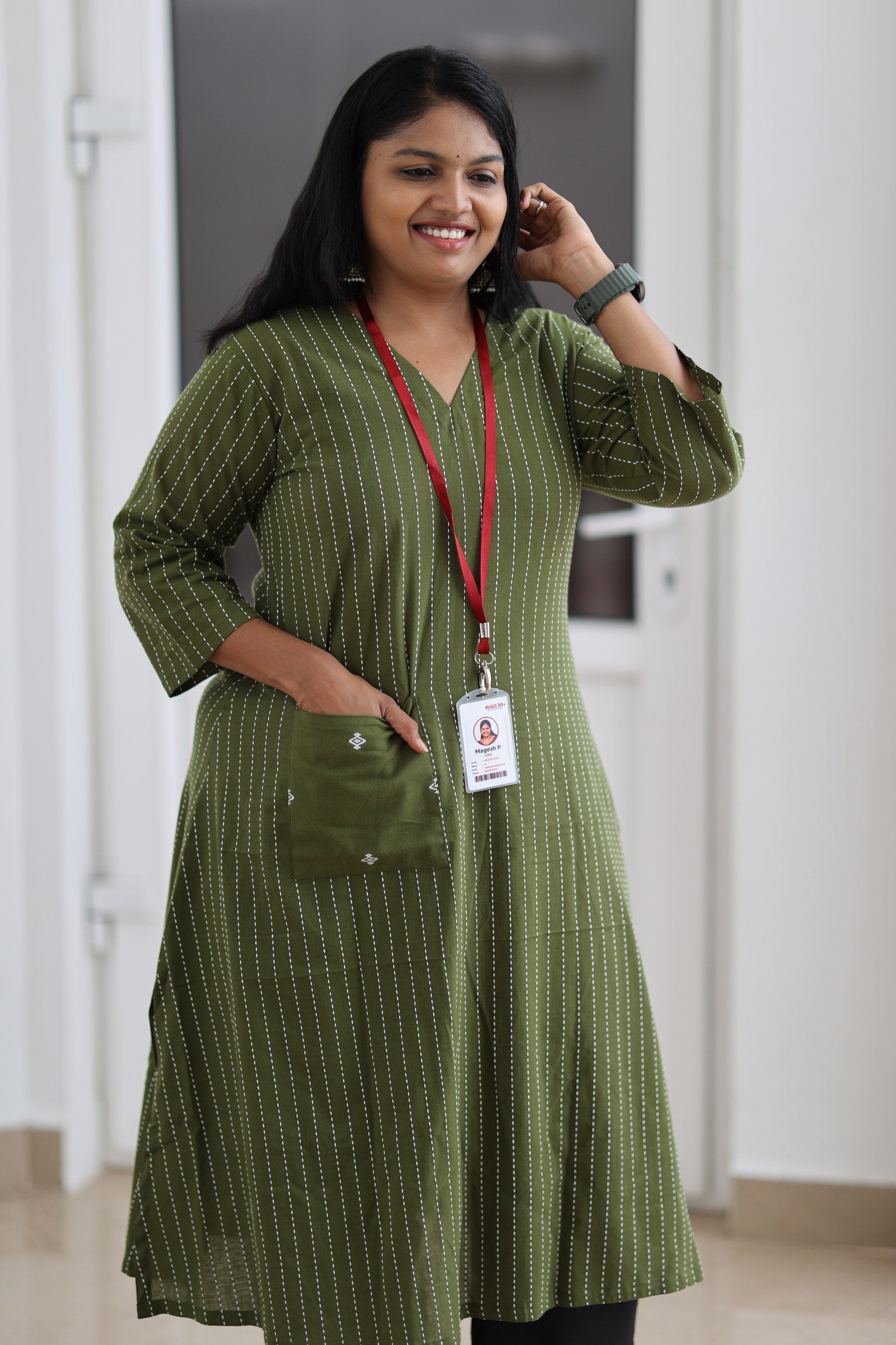 Front fit of olive striped 30+ office kurta with statement pocket