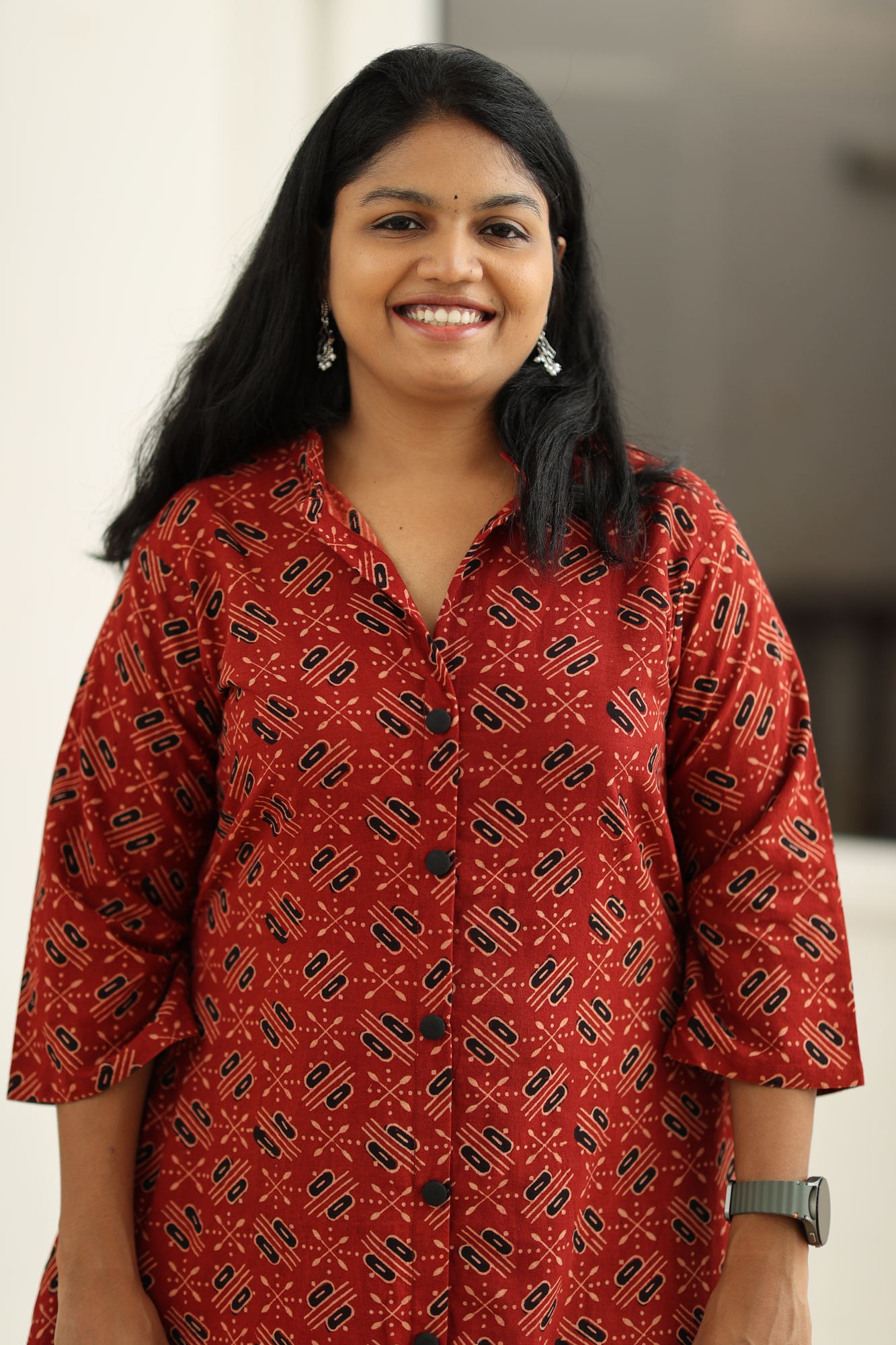 Madder red Ajrakh kurta, upper body close-up