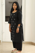 Black embroidered kurta set, three-quarter view