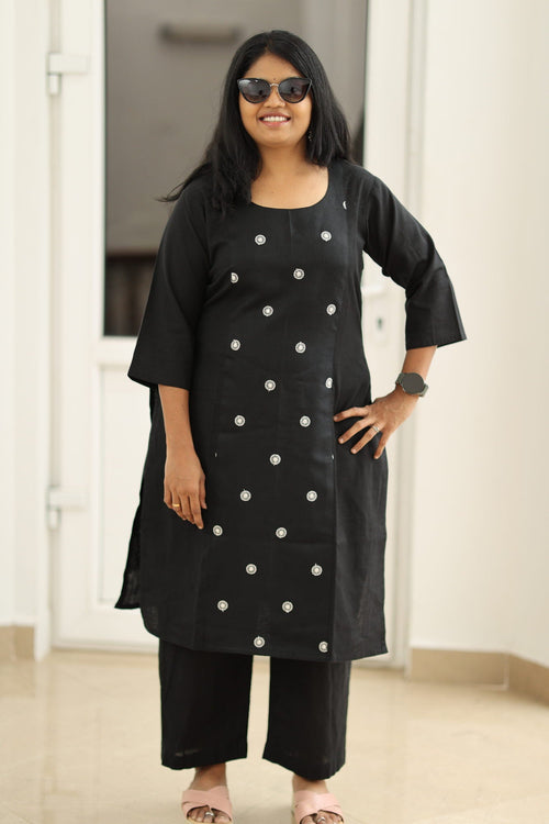 Black embroidered kurta set, styled