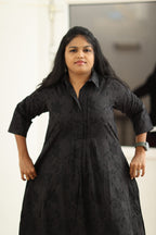 Black self-print kurta, upper body close-up