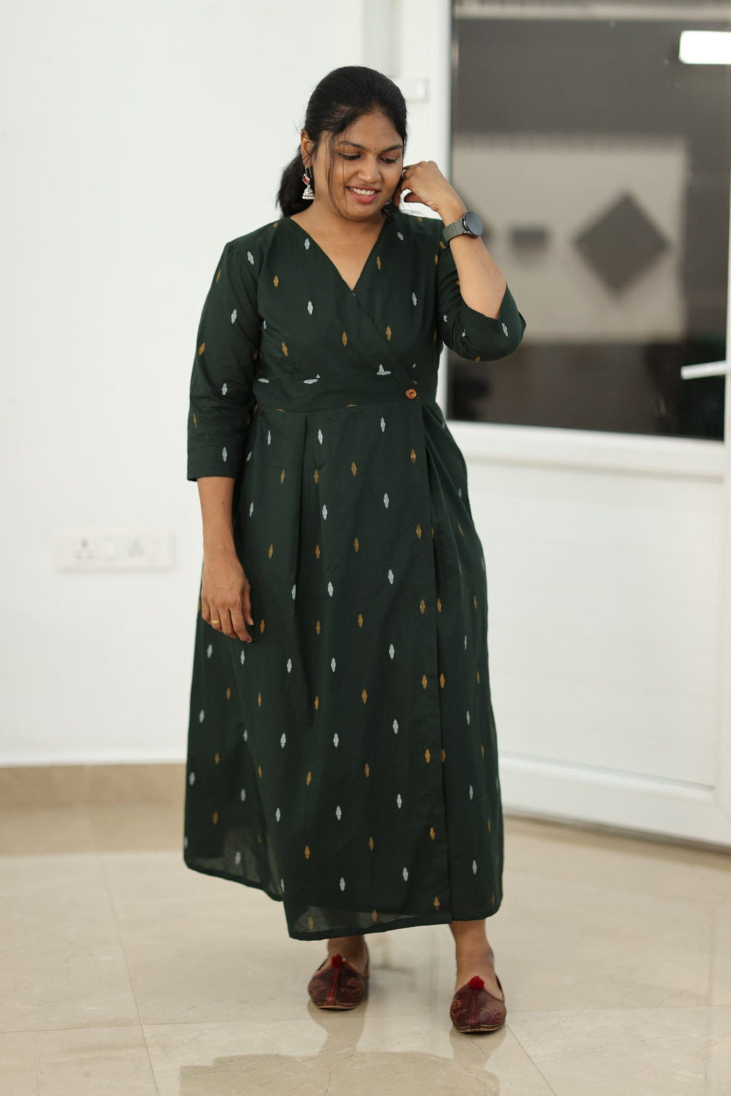 Full length view of the bottle green maxi dress