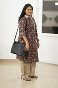 Styled with a black office bag