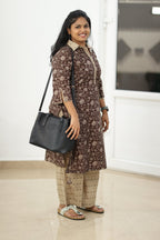 Styled with a black office bag