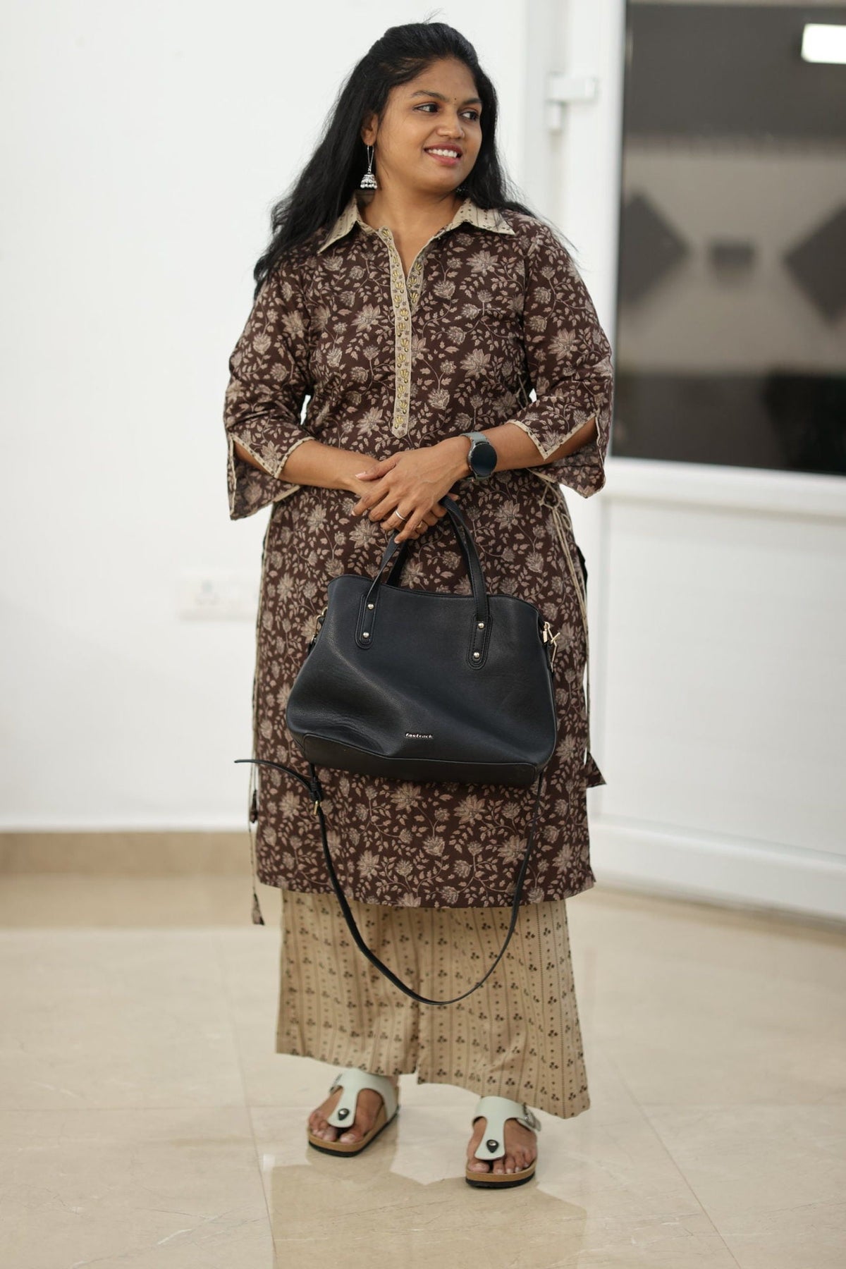 Styled for a work day with a black bag