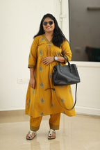 Mustard leaf block print kurta set styled with handbag