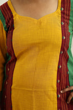 Neckline and maroon woven border in detail