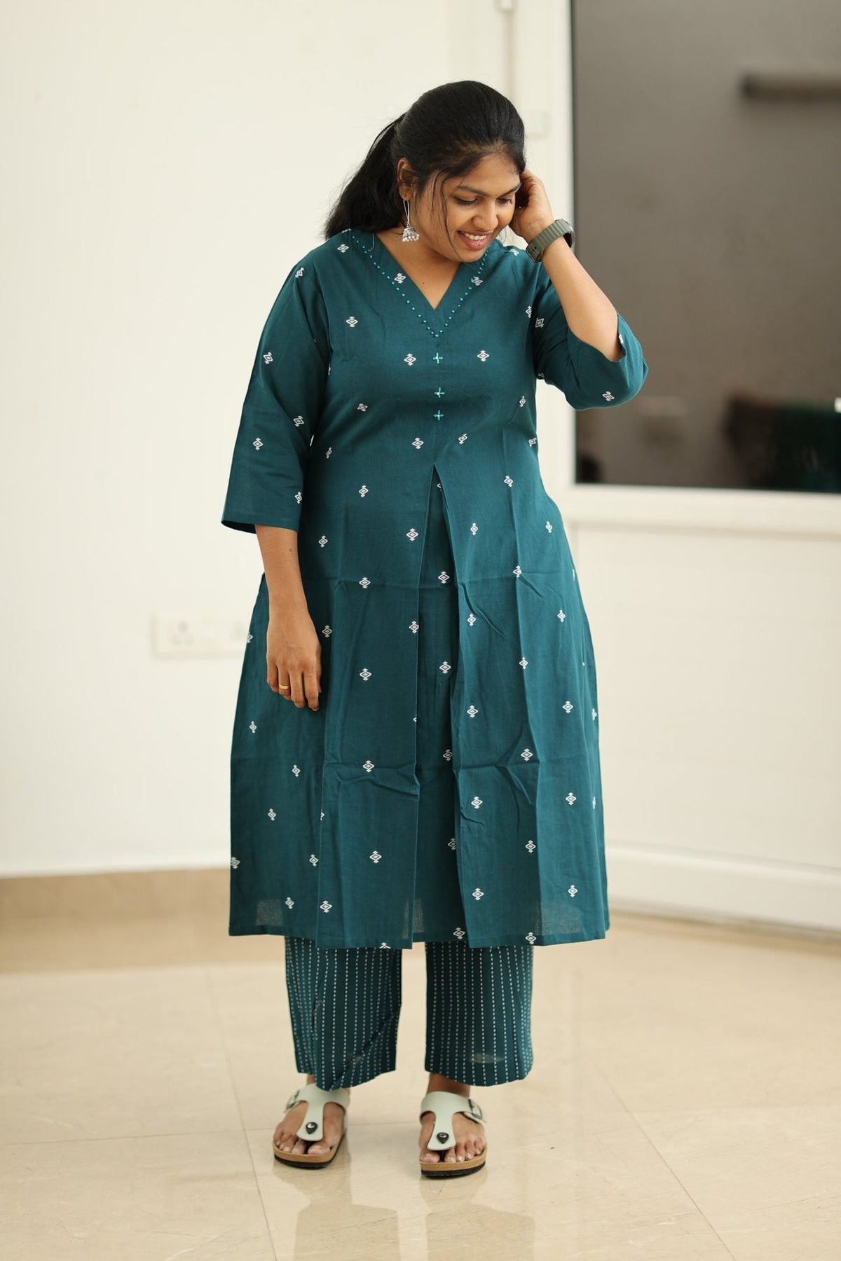 Deep teal kurta side view