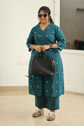 Deep teal kurta set office look with handbag