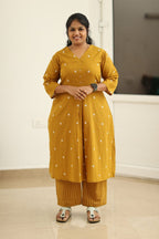 Amber gold woven butta office kurta set, front view