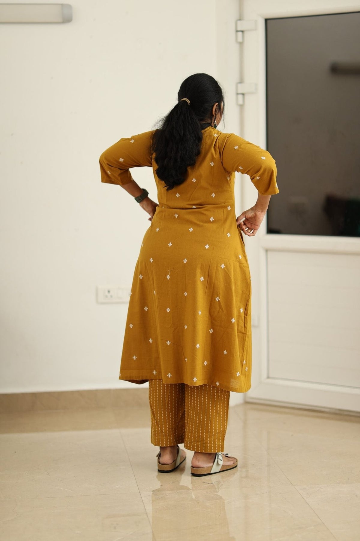 Amber gold kurta back view