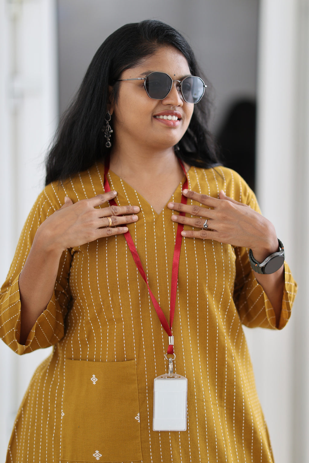 V-neck and front details of mustard striped 30+ office kurta