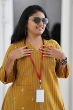 V-neck and front details of mustard striped 30+ office kurta